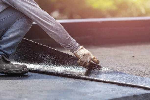 Professional Waterproofing technician working in Duluth, MN